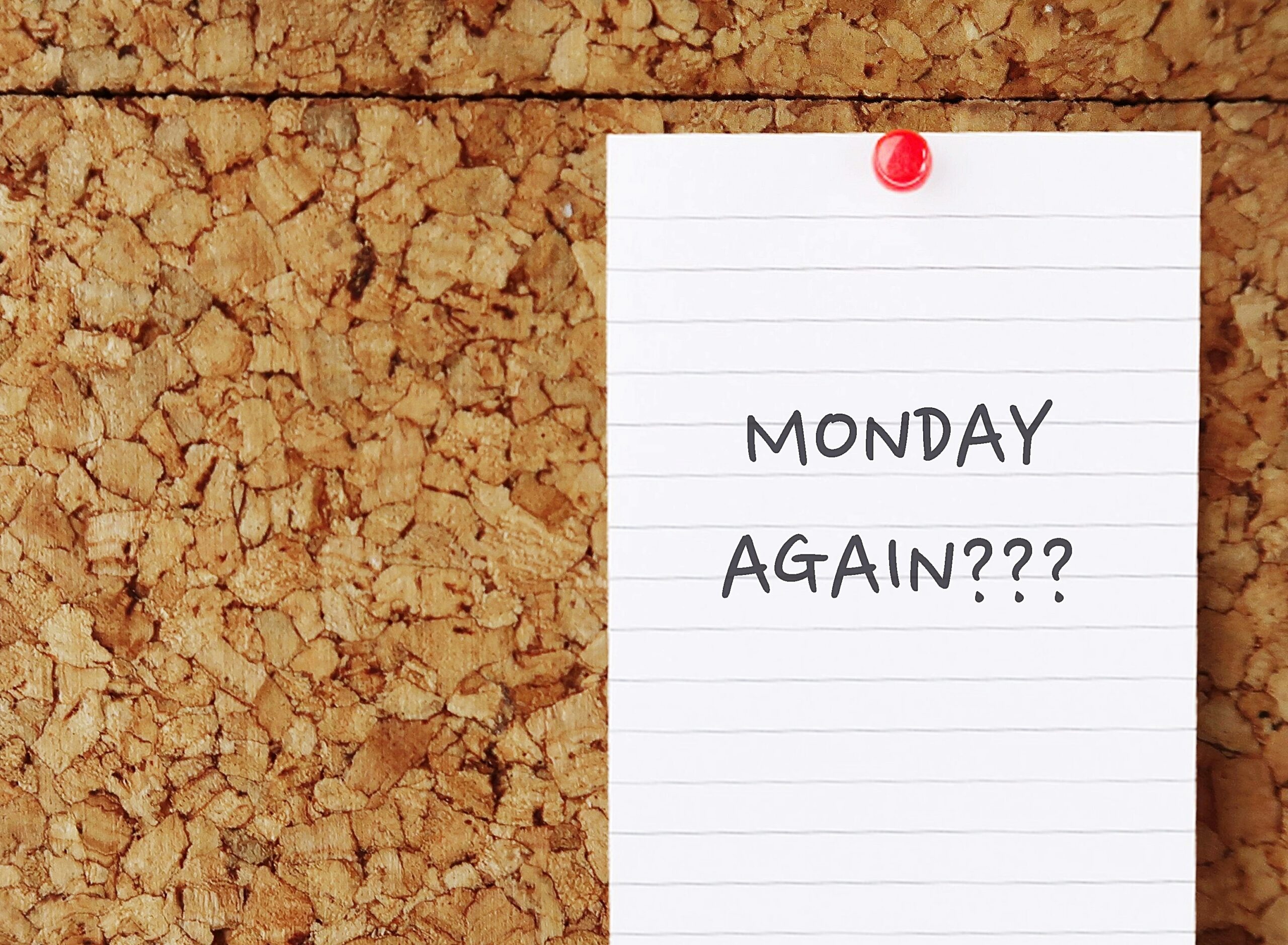 Note pin on cork board with handwriting MONDAY AGAIN? - worker feeling miserable, hate and dreaded Monday. Employees who work in toxic or unhappy workplace feeling Sunday Scaries